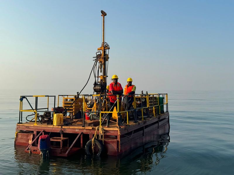 Crew working the rig on an anchored lake platform